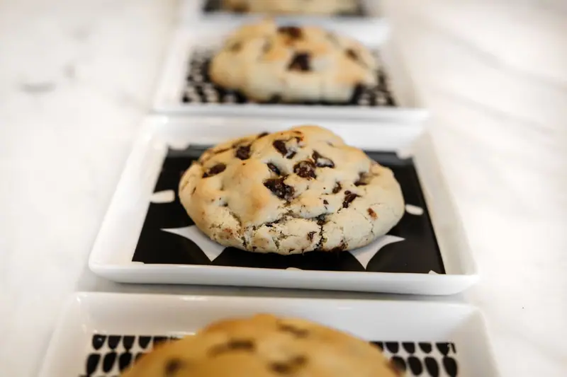 Chocolate chip cookies on white plates